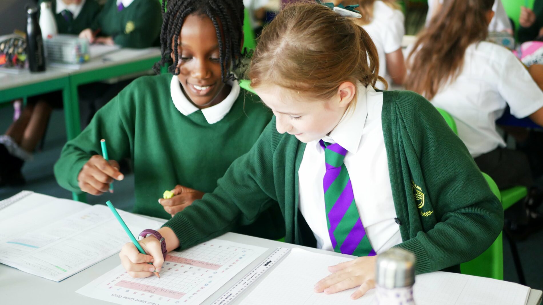 P1170467 pupils helping each other in maths lesson at halling primary school