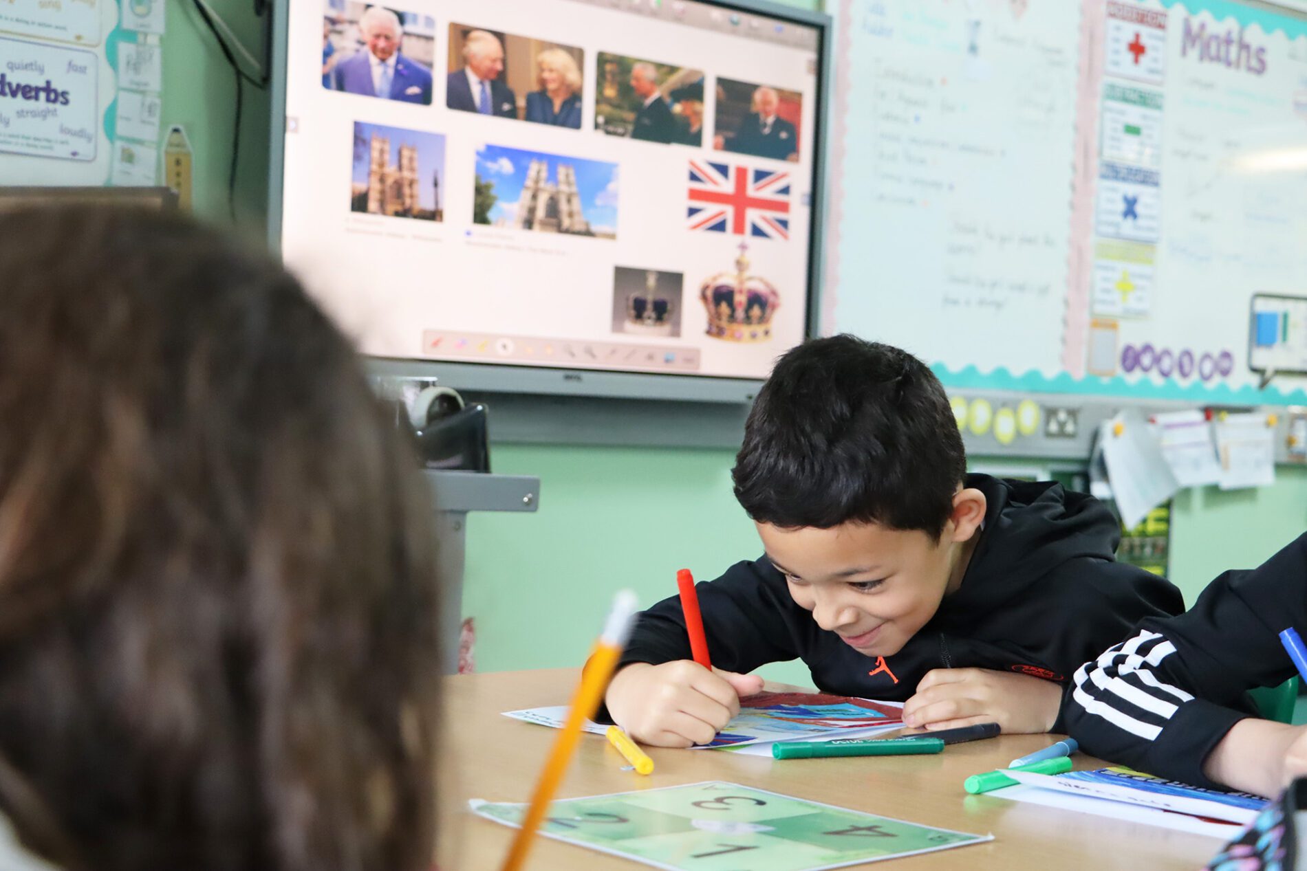 child drawing in history lesson at halling primary school