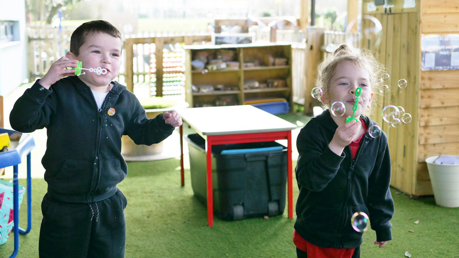 eyfs oupils blowing bubbles in science lessons